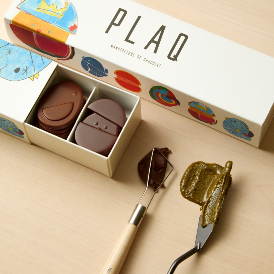 BOITE 36 NANO OEUFS DE PLAQ PUR NOIR PRALINÉ NOISETTES ET PISTACHES