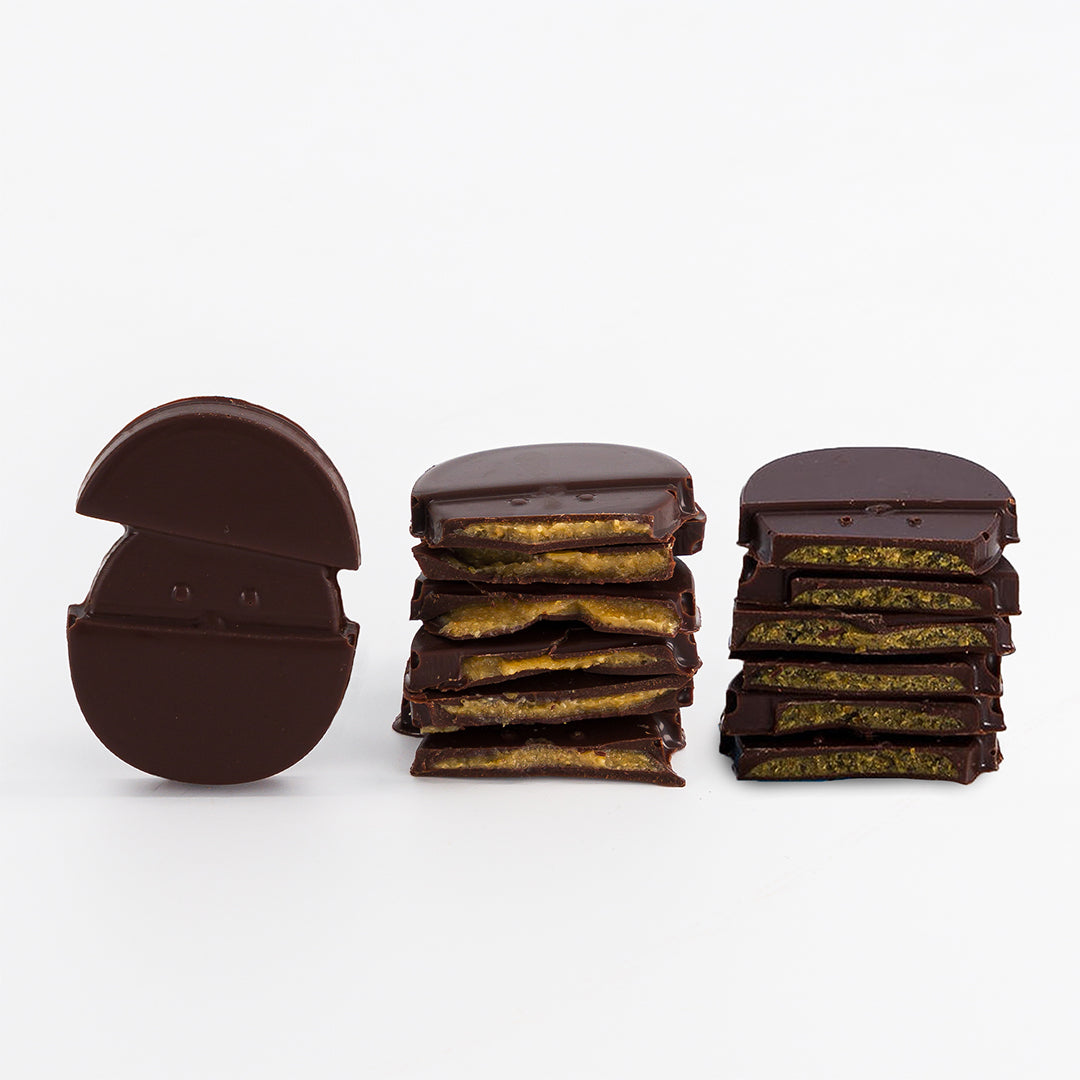 BOITE 36 NANO OEUFS DE PLAQ PUR NOIR PRALINÉ NOISETTES ET PISTACHES