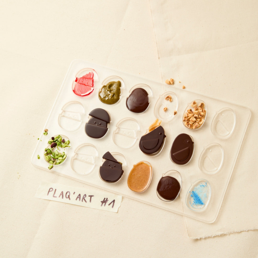 BOITE 36 NANO OEUFS DE PLAQ TRIO NOIR ET LAIT PRALINÉ NOISETTES ET NOIR PRALINÉ PISTACHES