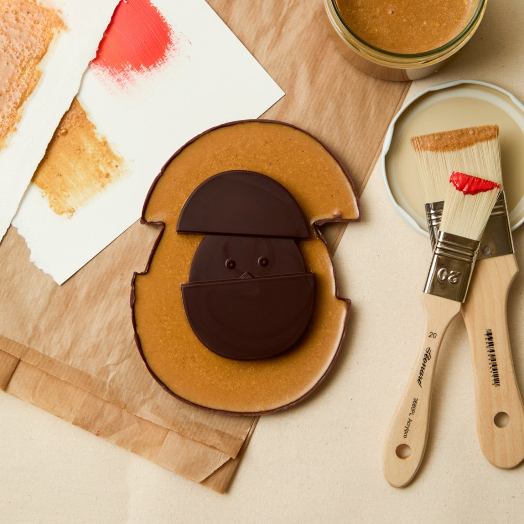 OEUF DE PLAQ PUR NOIR PRALINÉ NOISETTES