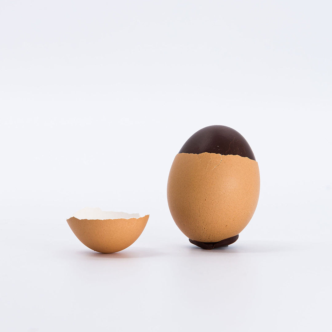 L'OEUF DE PLAQ EN COQUILLE PISTACHES