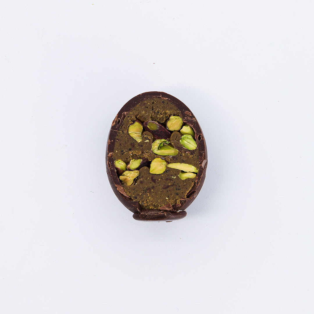 L'OEUF DE PLAQ EN COQUILLE PISTACHES