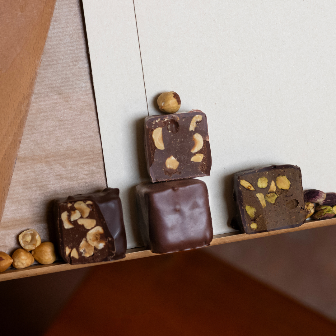 4 DARK PRALINE ROCHERS WITH HAZELNUTS AND PISTACHIOS