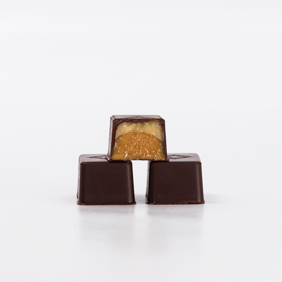 PURE DARK PRALINE CARAMEL COATED BONBONS