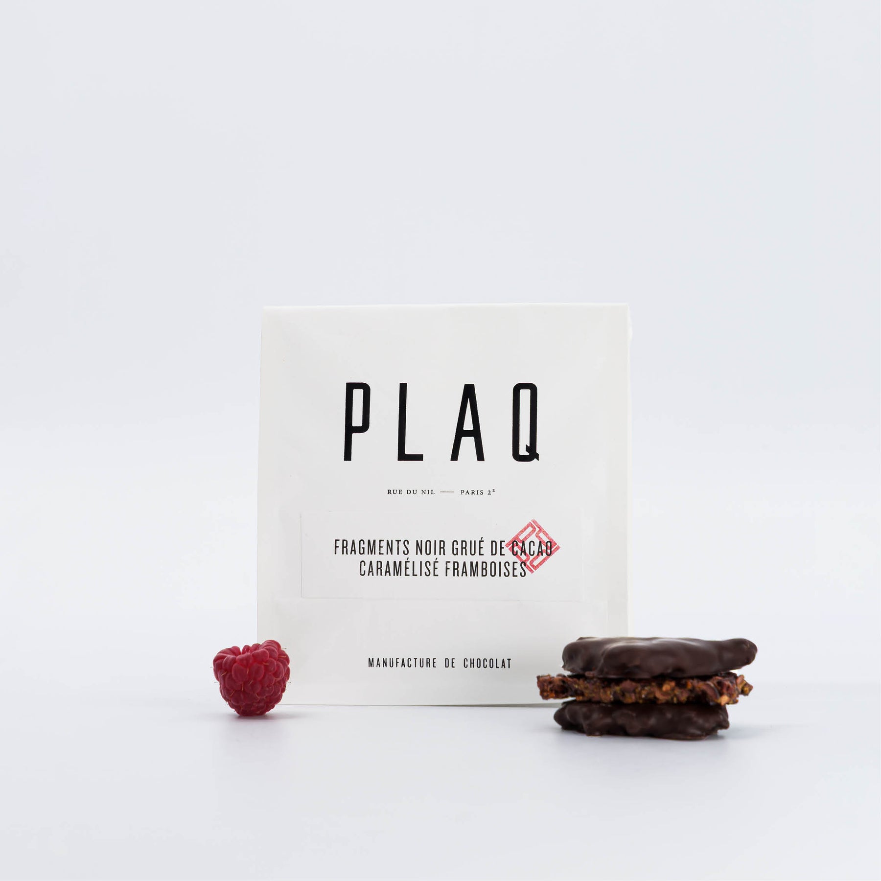 CRUNCHY FRAGMENTS PURE DARK COCOA NIBS CARAMELIZED WITH RASPBERRIES
