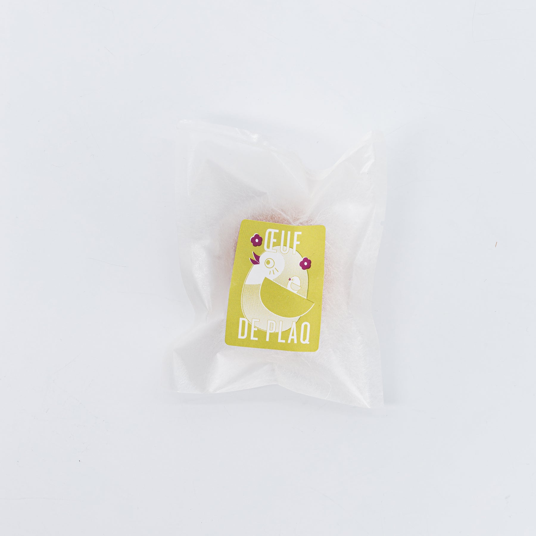 Oeuf de Plaq en coquille noir pistache Pâques 2026